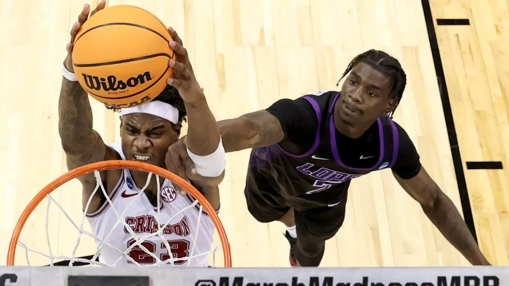 Alabama Crimson Tide forward Nick Pringle #23 dunks against Grand Canyon Antelopes guard Tyon Grant-Foster #7in the second round of the NCAA Men’s Basketball Tournament in 2024. (Source: Steph Chambers/Getty Images)