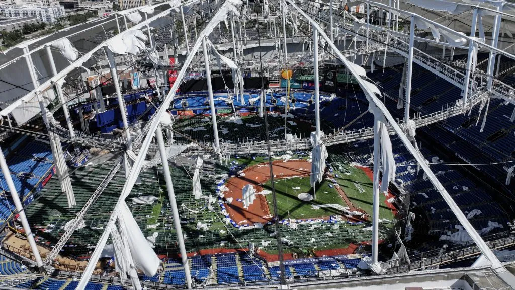 ST PETERSBURG – OCTOBER 10:  In this aerial view, the roof of Tropicana Field is seen in tatters after Hurricane Milton destroyed it as the storm passed through the area on October 10, 2024, in St. Petersburg, Florida. The storm made landfall as a Category 3 hurricane in the Siesta Key area of Florida, causing damage and flooding throughout Central Florida. (Photo by Joe Raedle/Getty Images)