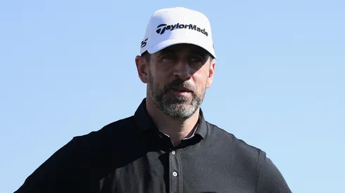NFL quarterback Aaron Rodgers talks with Charley Hoffman of the United States on the 10th hole during the practice round prior to the WM Phoenix Open 2025 at TPC Scottsdale on February 05, 2025 in Scottsdale, Arizona.
