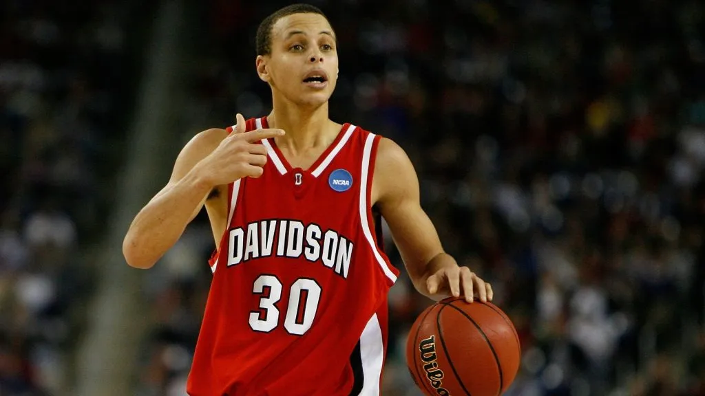 Stephen Curry #30 of the Davidson Wildcats directs the offense against the Kansas Jayhawks during the Midwest Regional Final of the 2008 NCAA Division I Men’s Basketball Tournament. (Source: Gregory Shamus/Getty Images)