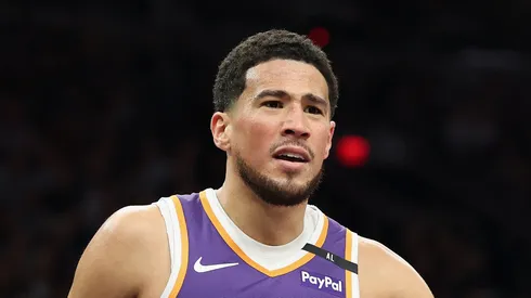 Devin Booker #1 of the Phoenix Suns reacts during the first half of the NBA game against the New Orleans Pelicans