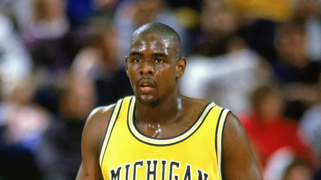 University of Michigan star forward Chris Webber strolls upcourt during a game against the University of Minnesota Golden Gophers
