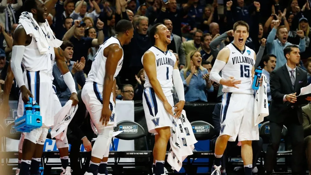 Jalen Brunson #1 and Ryan Arcidiacono #15 of the Villanova Wildcats celebrate defeating UNC Asheville Bulldogs 86 to 56 during the first round of the 2016 NCAA Men’s Basketball Tournament. (Source: Al Bello/Getty Images)