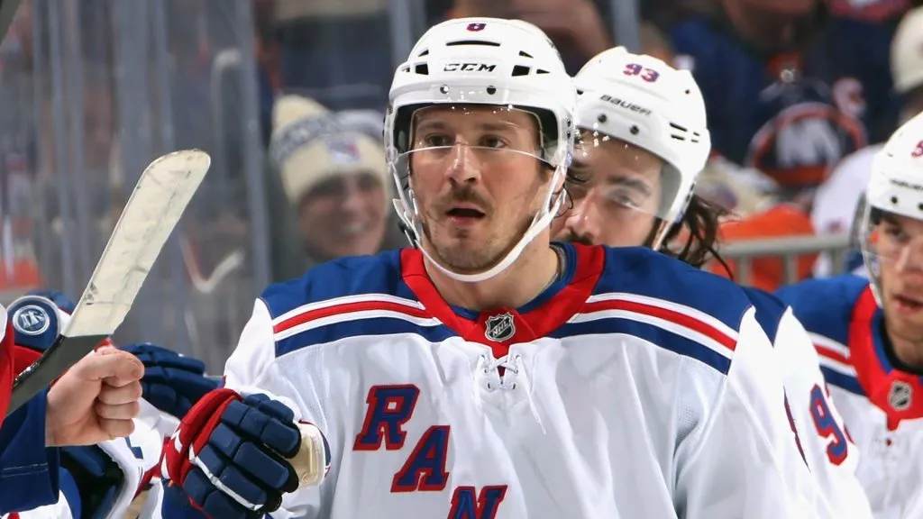 J.T. Miller #8 of the New York Rangers celebrates his second period goal against Ilya Sorokin #30 of the New York Islanders at UBS Arena on February 25, 2025 in Elmont, New York.