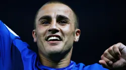 Fabio Cannavaro of Italy celebrates his team's victory in a penalty shootout at the end of the FIFA World Cup Germany 2006 Final match against France.