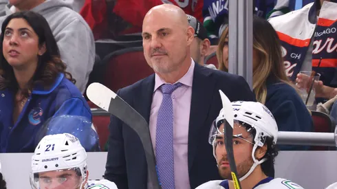 Head coach Rick Tocchet of the Vancouver Canucks looks on against the Chicago Blackhawks during the first period at the United Center on October 22, 2024 in Chicago, Illinois.