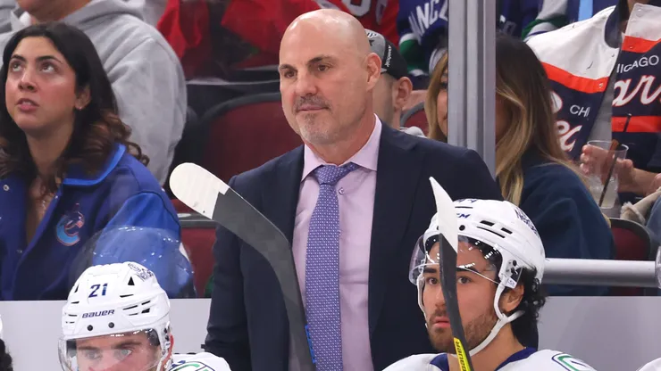 Head coach Rick Tocchet of the Vancouver Canucks looks on against the Chicago Blackhawks during the first period at the United Center on October 22, 2024 in Chicago, Illinois.