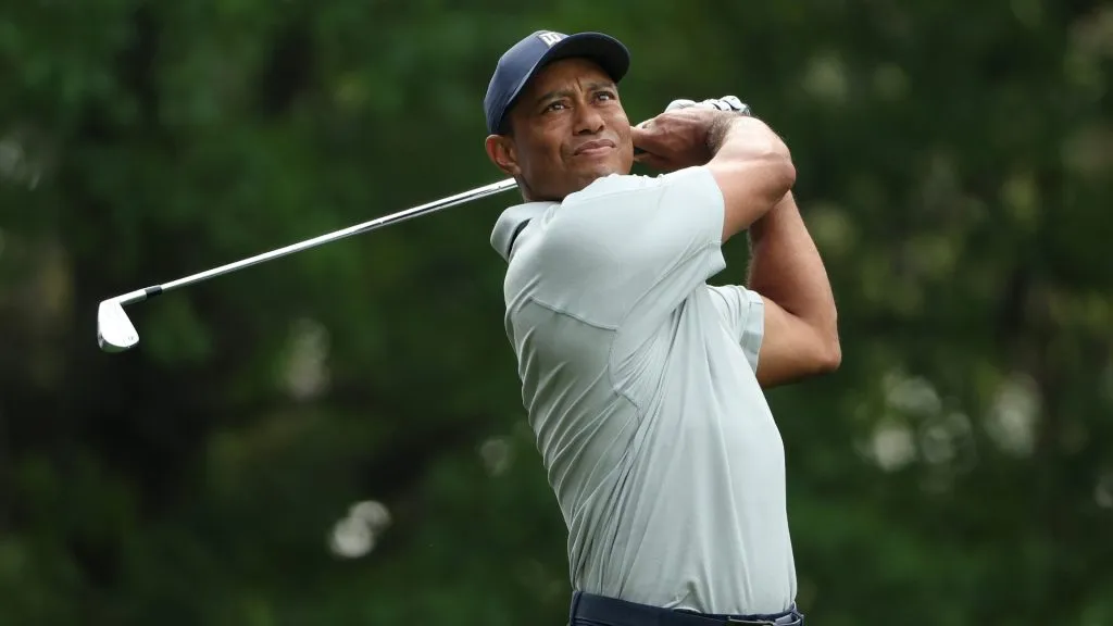 Tiger Woods of the United States plays his shot from the fourth tee during a practice round prior to the 2023 Masters Tournament at Augusta National Golf Club. (Source: Patrick Smith/Getty Images)