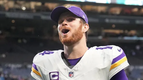 Sam Darnold #14 of the Minnesota Vikings celebrates as he leaves the field after his team defeated the Seattle Seahawks at Lumen Field on December 22, 2024 in Seattle, Washington.