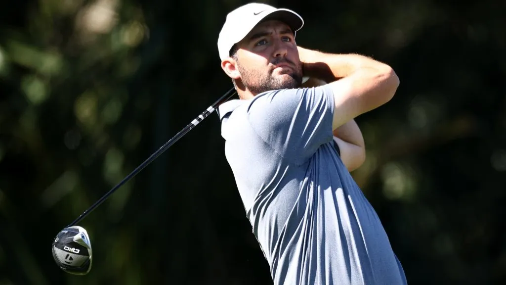 Scottie Scheffler of the United States plays his shot from the seventh tee prior to THE PLAYERS Championship on the Stadium Course at TPC Sawgrass on March 12, 2025. (Source: Jared C. Tilton/Getty Images)