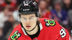 Connor Bedard #98 of the Chicago Blackhawks looks on against the New York Rangers during the first period at the United Center on January 05, 2025 in Chicago, Illinois.