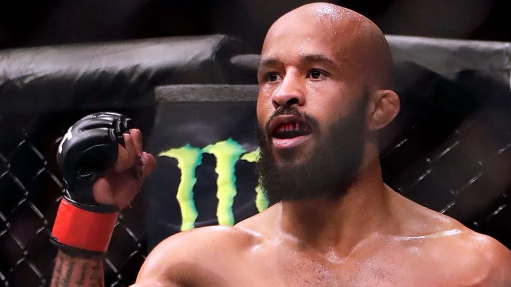Demetrious Johnson celebrates after defeating Wilson Reis to win their Flyweight Championship bout on UFC Fight Night at the Sprint Center on April 15, 2017. (Source: Jamie Squire/Getty Images)