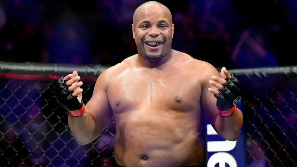 Daniel Cormier of the United States celebrates his win by submission over Derrick Lewis of the United States in their heavyweight title bout during the UFC 230 event. (Source: Steven Ryan/Getty Images)