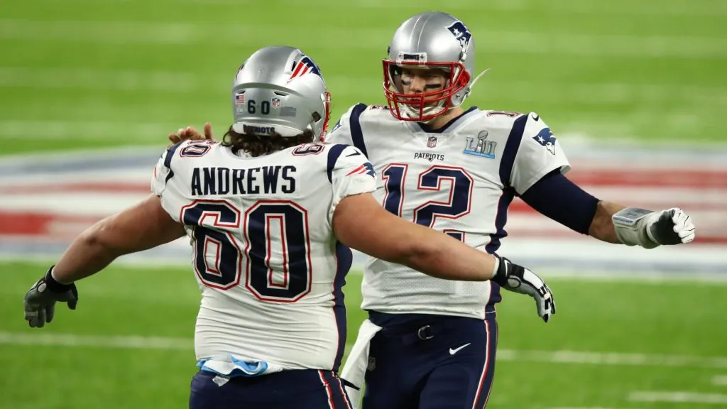Tom Brady #12 celebrates with David Andrews #60 of the New England Patriots during the second quarter against the Philadelphia Eagles in Super Bowl LII at U.S. Bank Stadium on February 4, 2018 in Minneapolis, Minnesota.