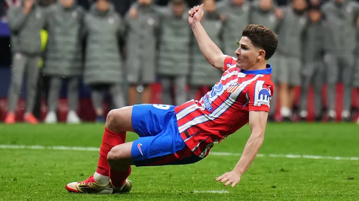 Julian Alvarez of Atletico de Madrid scores the team's second penalty in the penalty shoot out against Real Madrid, which is later ruled out following a VAR Review due to an improper kick.