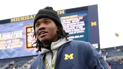 Michigan commitment Bryce Underwood on the field with his girlfriend prior to the Michigan Wolverines playing the Northwestern Wildcats at Michigan Stadium on November 23, 2024 in Ann Arbor, Michigan.