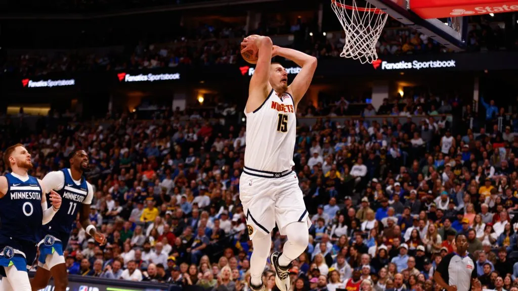 Nikola Jokic #15 of the Denver Nuggets dunks during the first quarter against the Minnesota Timberwolves at Ball Arena. (Justin Edmonds/Getty Images)
