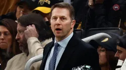 Boston Bruins head coach Joe Sacco looks on behind the bench during the first period against the Utah Hockey Club at TD Garden on November 21, 2024 in Boston, Massachusetts.