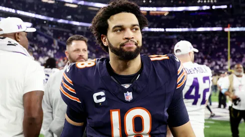 Caleb Williams #18 of the Chicago Bears walks off the field after losing to the Minnesota Vikings 30-12 at U.S. Bank Stadium on December 16, 2024.