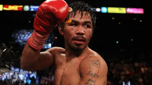 Filipino icon Manny Pacquiao celebrates his 12 round TKO victory against Miguel Cotto during their WBO welterweight title fight at the MGM Grand Garden Arena on November 14, 2009.