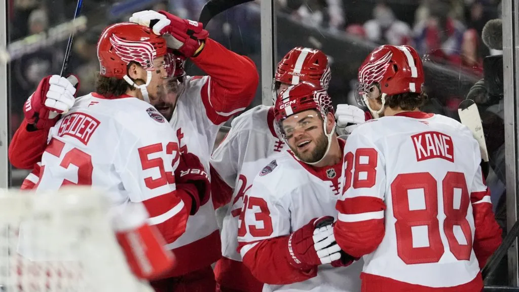 Alex DeBrincat #93 of the Detroit Red Wings is congratulated by his teammates after scoring a goal against the Columbus Blue Jackets during the first period of the 2025 NHL Stadium Series at Ohio Stadium on March 01, 2025 in Columbus, Ohio. (Photo by Jason Mowry/Getty Images)