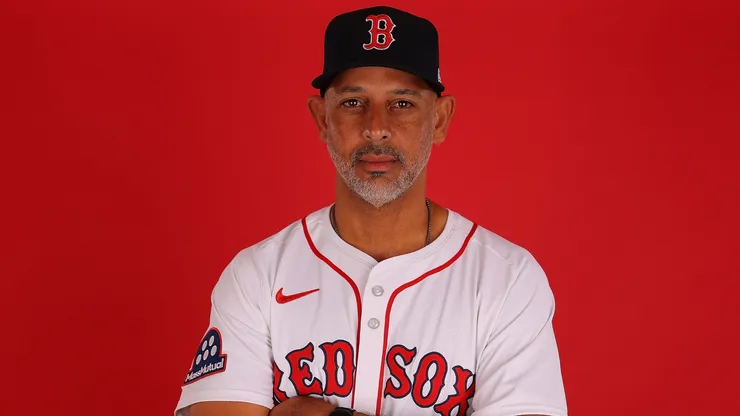 Manager Alex Cora #13 of the Boston Red Sox poses for a portrait during photo day at JetBlue Park at Fenway South on February 18, 2025 in Fort Myers, Florida.