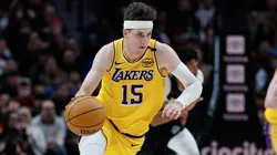 Austin Reaves #15 of the Los Angeles Lakers dribbles during the fourth quarter against the Portland Trail Blazers at Moda Center on February 20, 2025 in Portland, Oregon. The Los Angeles Lakers won 110-102.