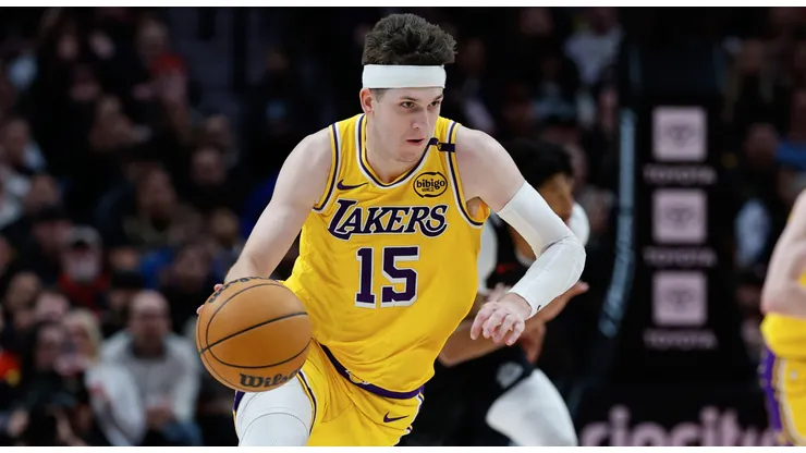 Austin Reaves #15 of the Los Angeles Lakers dribbles during the fourth quarter against the Portland Trail Blazers at Moda Center on February 20, 2025 in Portland, Oregon. The Los Angeles Lakers won 110-102.