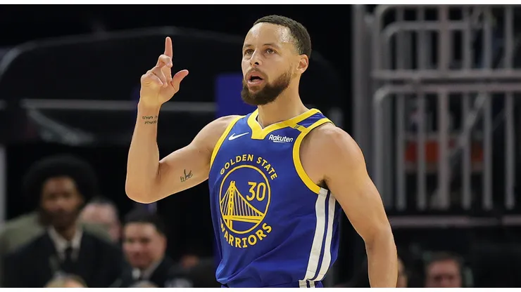 Stephen Curry #30 of the Golden State Warriors reacts after making a three-point basket against the Portland Trail Blazers during the first half at Chase Center on March 10, 2025.