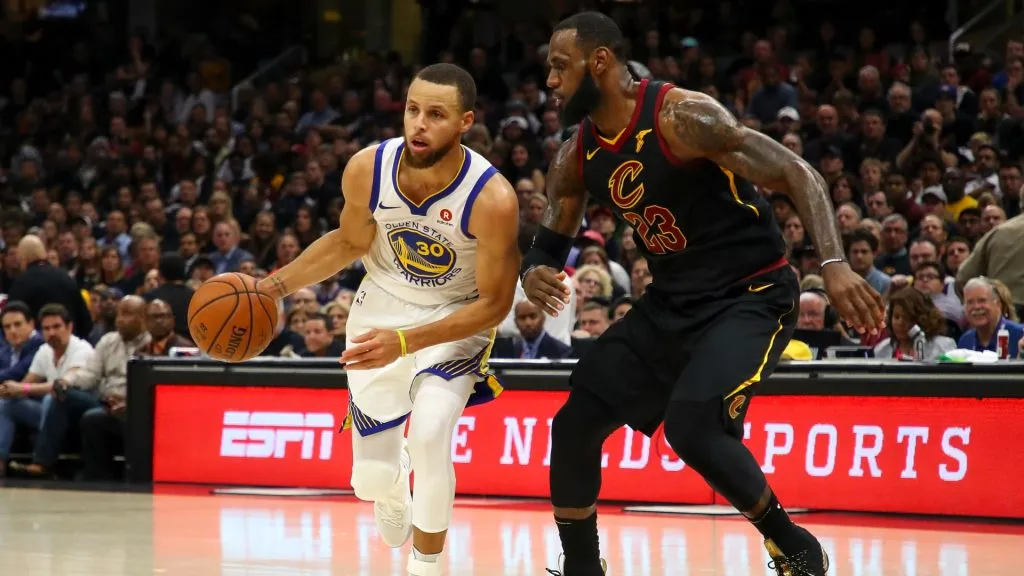 Stephen Curry #30 drives to the basket defended by LeBron James #23 in the first half during Game Four of the 2018 NBA Finals. (Gregory Shamus/Getty Images)