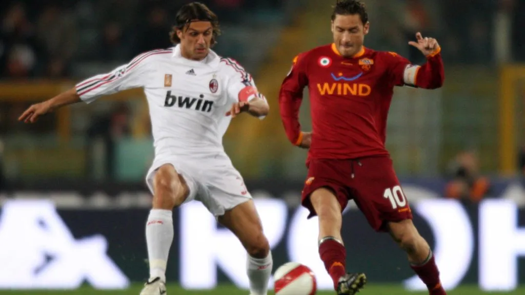 Francesco Totti of Roma Paolo Maldini of Milan in action during the Serie A match between Roma and Milan at the Stadio Olimpico. (New Press/Getty Images)