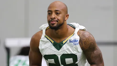 AJ Dillon #28 of the Green Bay Packers participates in drills during the Green Bay Packers Minicamp at Ray Nitschke Field on June 04, 2024 in Green Bay, Wisconsin.