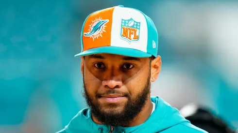 Tua Tagovailoa #1 of the Miami Dolphins warms up before a game against the Tennessee Titans at Hard Rock Stadium on December 11, 2023 in Miami Gardens, Florida.