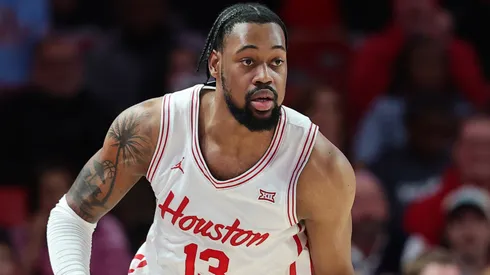 J'Wan Roberts #13 of the Houston Cougars handles the ball against the TCU Horned Frogs during the second half at Fertitta Center on January 06, 2025 in Houston, Texas.