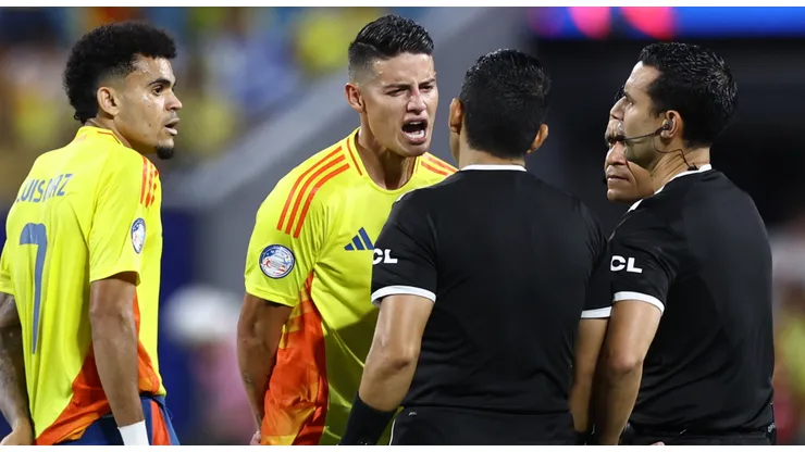 Luis Diaz (L) and James Rodriguez of Colombia argue with referees during the CONMEBOL Copa America 2024 semifinal match between Uruguay and Colombia at Bank of America Stadium on July 10, 2024 in Charlotte, North Carolina.