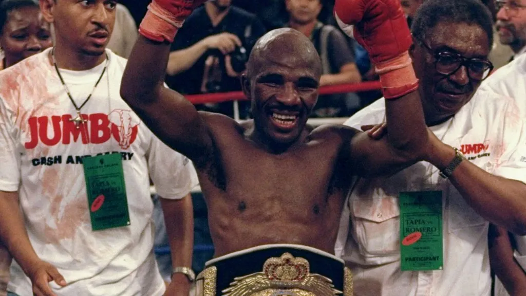 Jake Matlala of South Africa celebrates his win over Michael Carbajal at Caesar”s Palace in 1997. (Source: Todd Warshaw /Allsport)