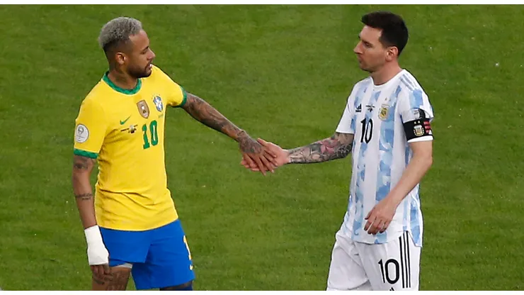 Neymar Jr. of Brazil greets Lionel Messi of Argentina as Lautaro Martinez of Argentina prepares for kick off prior to the final of Copa America Brazil 2021 between Brazil and Argentina at Maracana Stadium on July 10, 2021 in Rio de Janeiro, Brazil.