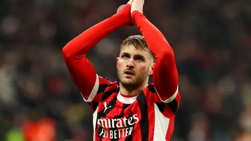 Santiago Gimenez of AC Milan celebrates scoring his team's first goal during the UEFA Champions League 2024/25 League Knockout Play-off second leg match between AC Milan and Feyenoord in 2025.