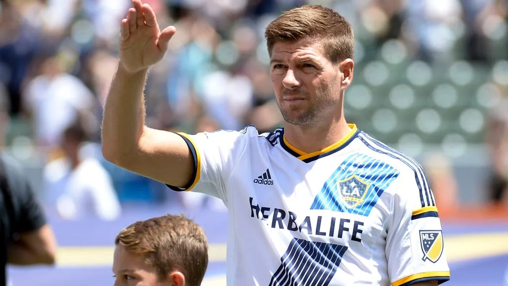 Steven Gerrard #8 of the Los Angeles Galaxy waves at his family in the owner box before the start of soccer match between Los Angeles Galaxy and Seattle Sounders at StubHub Center August 9, 2015. (Source: Kevork Djansezian/Getty Images)