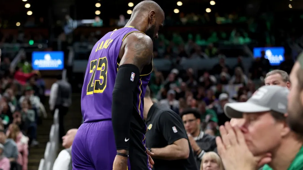 LeBron James #23 of the Los Angeles Lakers leaves the game after an injury during the second half against the Boston Celtics at TD Garden. (Elsa/Getty Images)