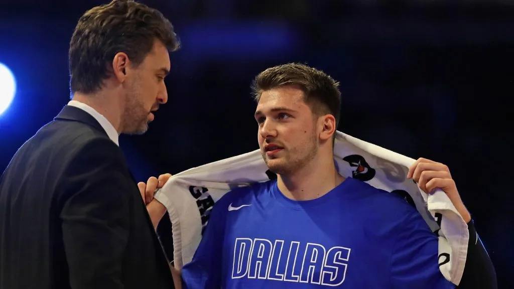 Pau Gasol talks with Luka Doncic during the 2020 NBA All-Star – Rising Stars Game. (Jonathan Daniel/Getty Images)