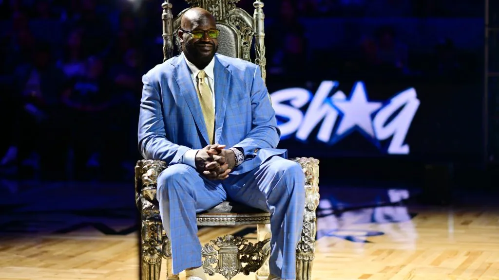 Shaquille O’Neal looks on as his #32 jersey is retired at Kia Center following a game between the Orlando Magic and the Oklahoma City Thunder on February 13, 2024. (Source: Julio Aguilar/Getty Images)