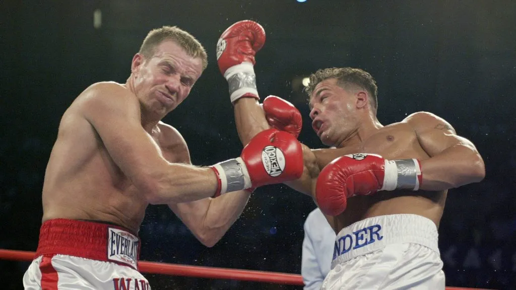 Arturo Gatti lands a right hook to Micky Ward during their Junior Welterweight bout at Boardwalk Hall on June 7, 2003. (Source: Al Bello/Getty Images)