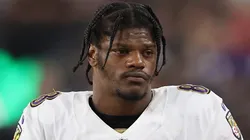 Quarterback Lamar Jackson #8 of the Baltimore Ravens holds a Microsoft surface on the sidelines during the NFL game at Allegiant Stadium on September 13, 2021 in Las Vegas, Nevada. The Raiders defeated the Ravens 33-27 in overtime.