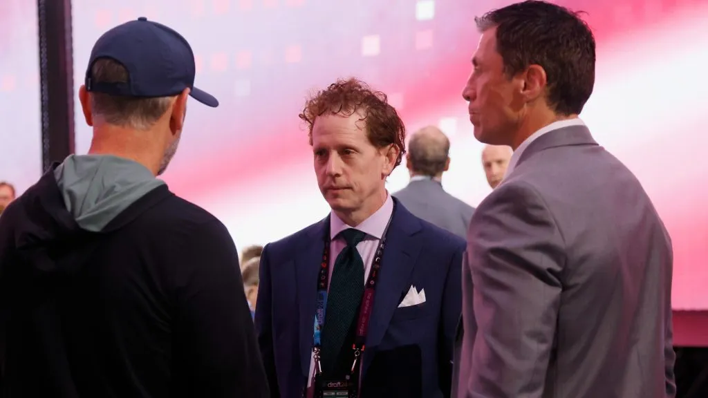(L-R) Tom Dundon, Eric Tulsky and Rod Brind’Amour during the 2024 Upper Deck NHL Draft at Sphere on June 29, 2024 in Las Vegas, Nevada. (Photo by Bruce Bennett/Getty Images)