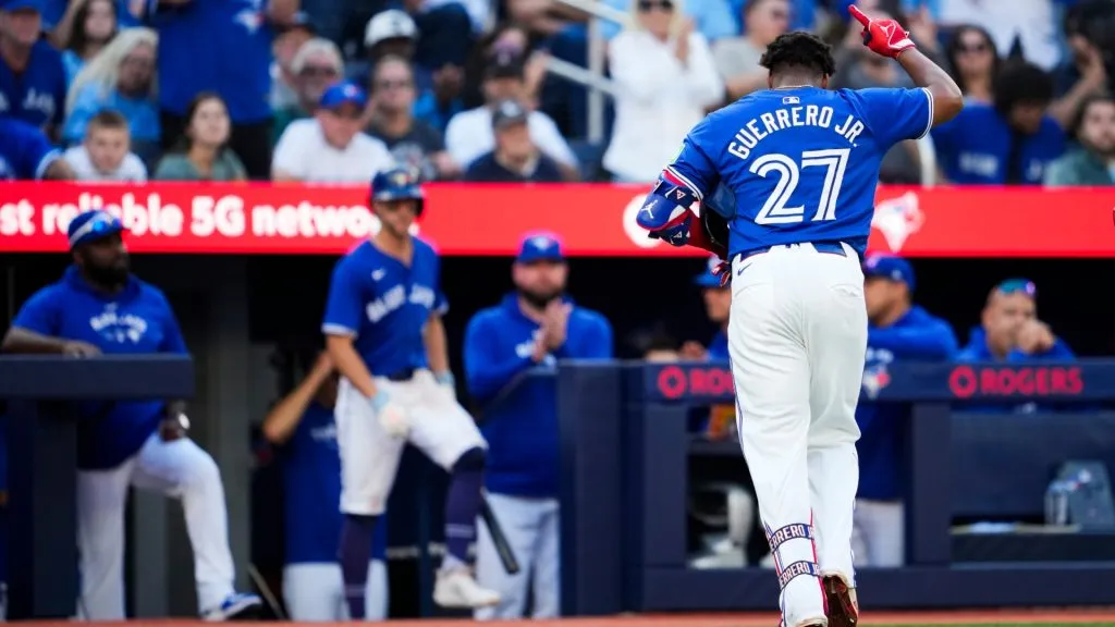 Vladimir Guerrero Jr. #27 of the Toronto Blue Jays salutes the crowd while coming out of the game after drawing a walk for his last at bat of the season, against the Miami Marlins, in their MLB game at the Rogers Centre on September 29, 2024 in Toronto, Ontario, Canada. (Photo by Mark Blinch/Getty Images)
