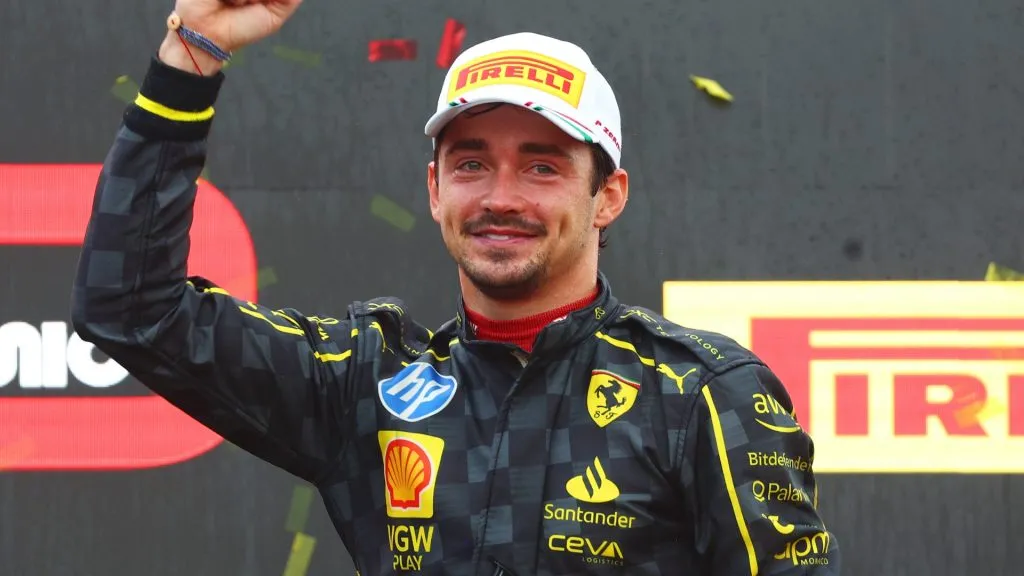 Race winner Charles Leclerc of Monaco and Ferrari celebrates on the podium during the F1 Grand Prix of Italy at Autodromo Nazionale Monza on September 01, 2024. (Source: Clive Rose/Getty Images)