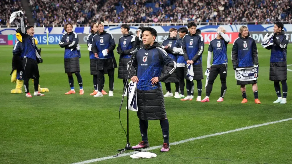 Captain Wataru Endo of Japan applauds fans as the team qualifies for the 2026 FIFA World Cup following the 2-0 victory over Bahrain. (Koji Watanabe/Getty Images)