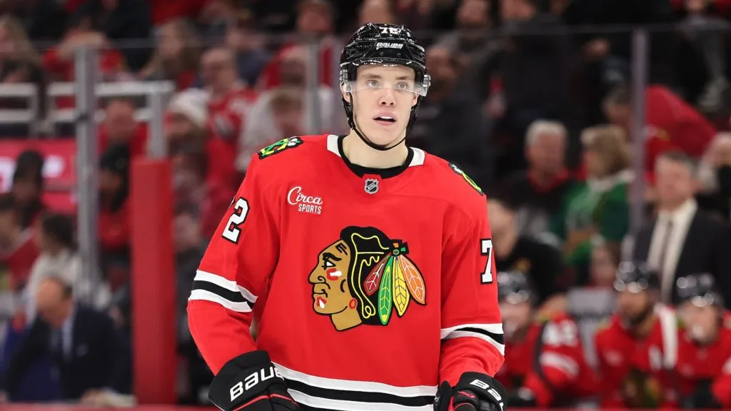 Alex Vlasic #72 of the Chicago Blackhawks looks on against the Edmonton Oilers during the second period at the United Center on January 11, 2025 in Chicago, Illinois.