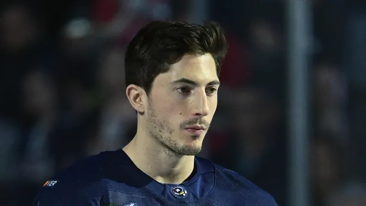 Zach Werenski #8 of Team USA stands at attention during the national anthem prior to playing against Team Finland in the NHL 4 Nations Face-Off at Bell Centre on February 13, 2025 in Montreal, Quebec, Canada.